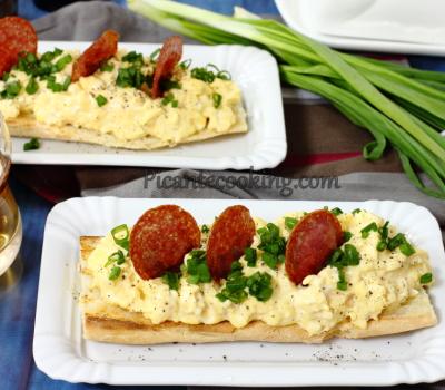 Delicate creamy scrambled eggs with cheese 