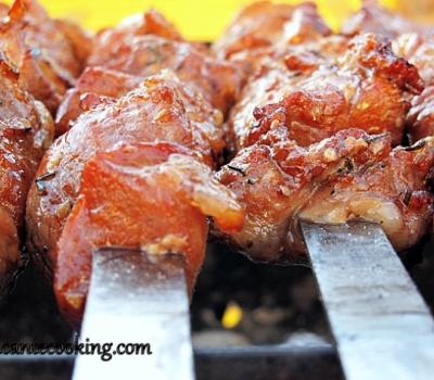 Grilled pork on skewers marinated in coke and soy sauce
