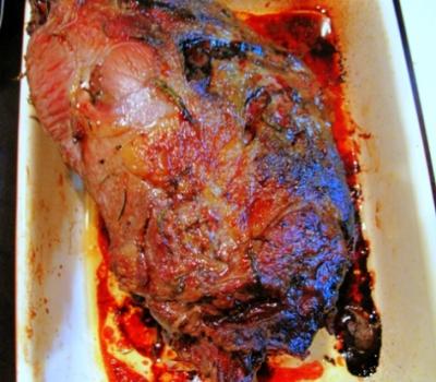 Roasted leg of lamb marinated in wine and herbs 