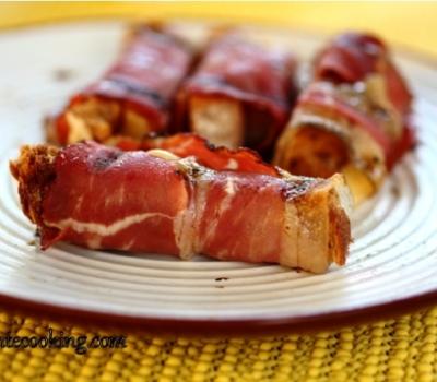 Rolls of bacon with bread and cheese 